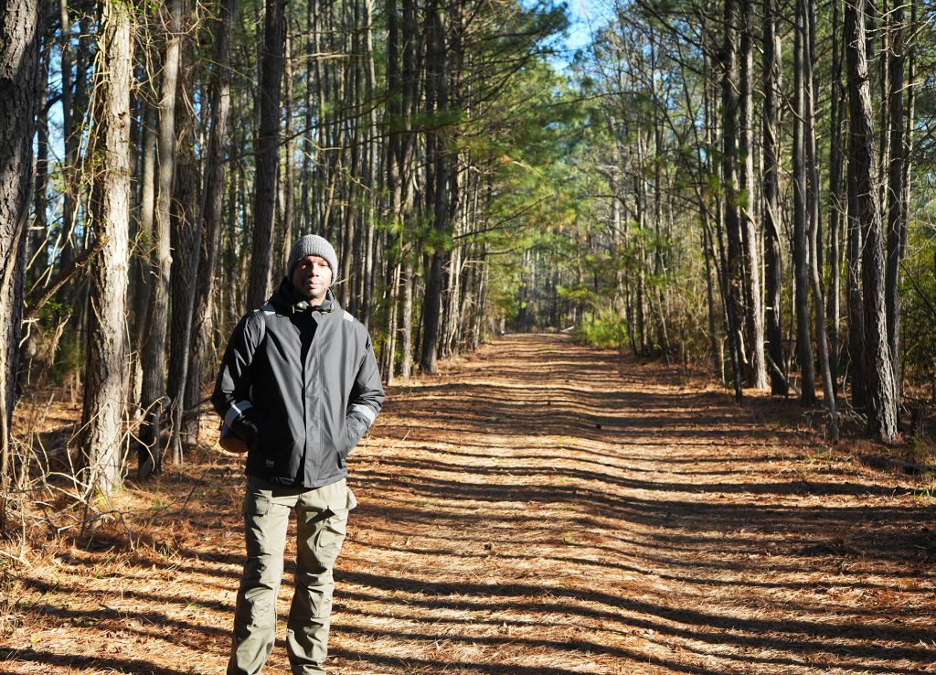 Man standing in a forest