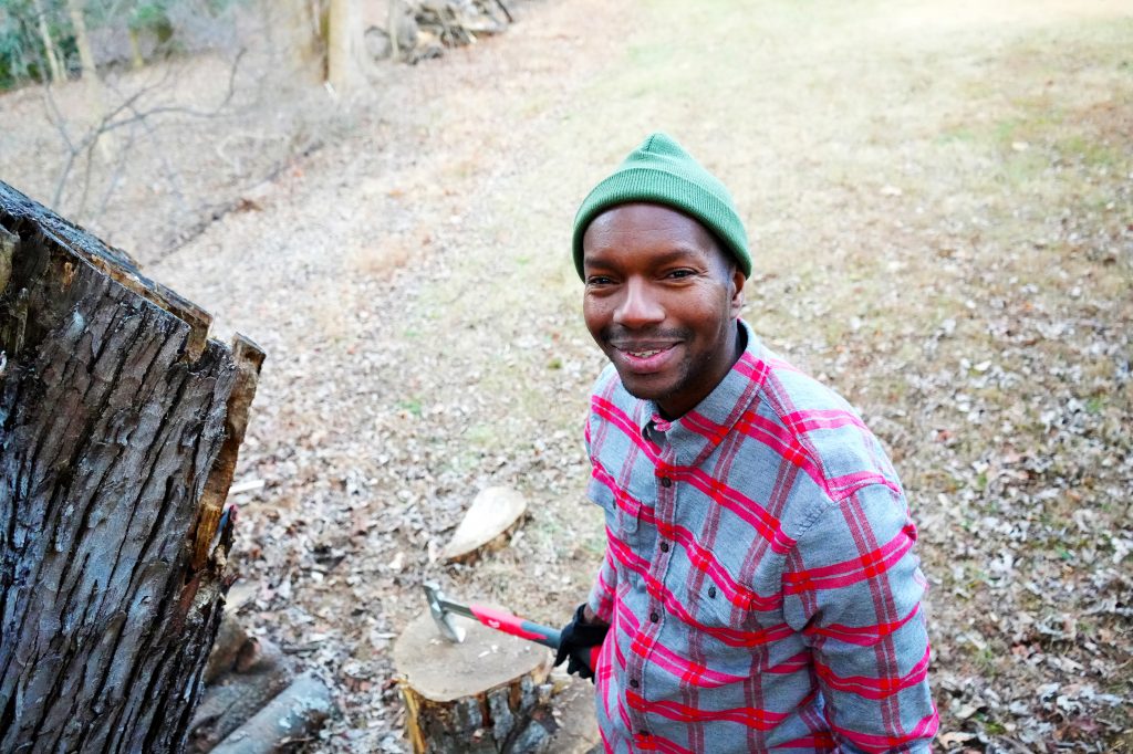 Man smiling up at a camera